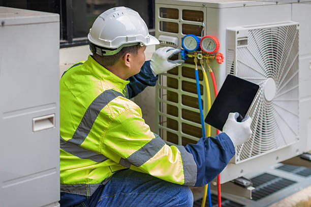 Professional Hvac technician working in Linwood, MA